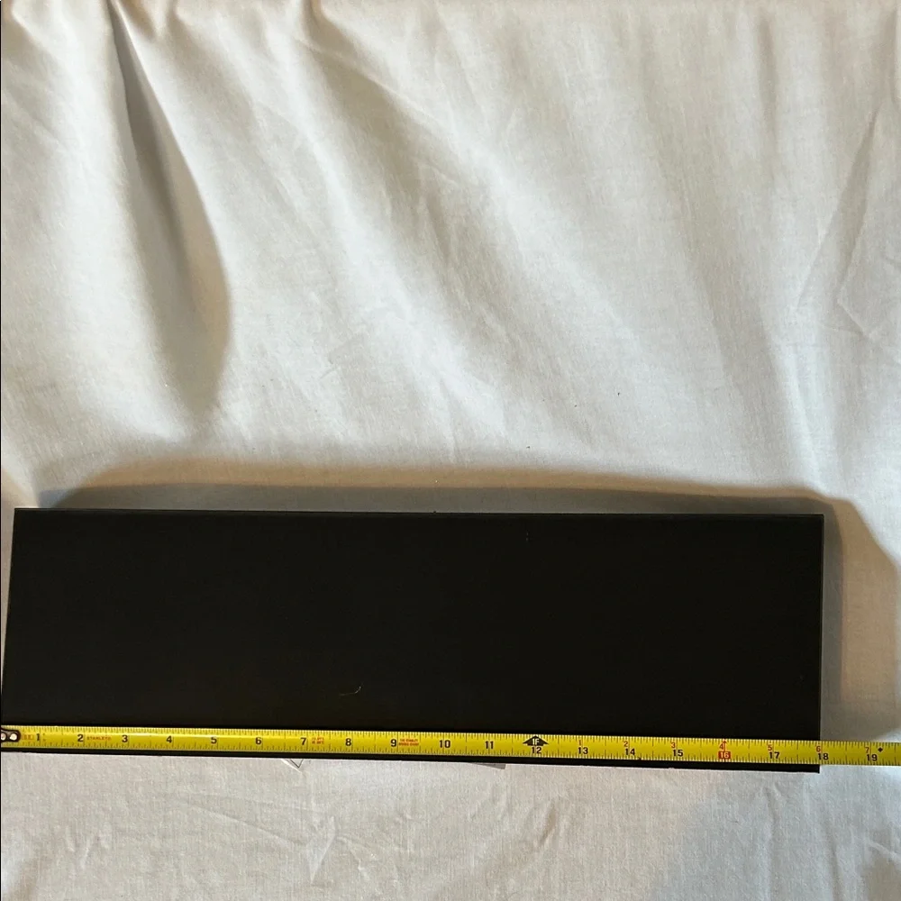 Sleek Black Wall Shelf